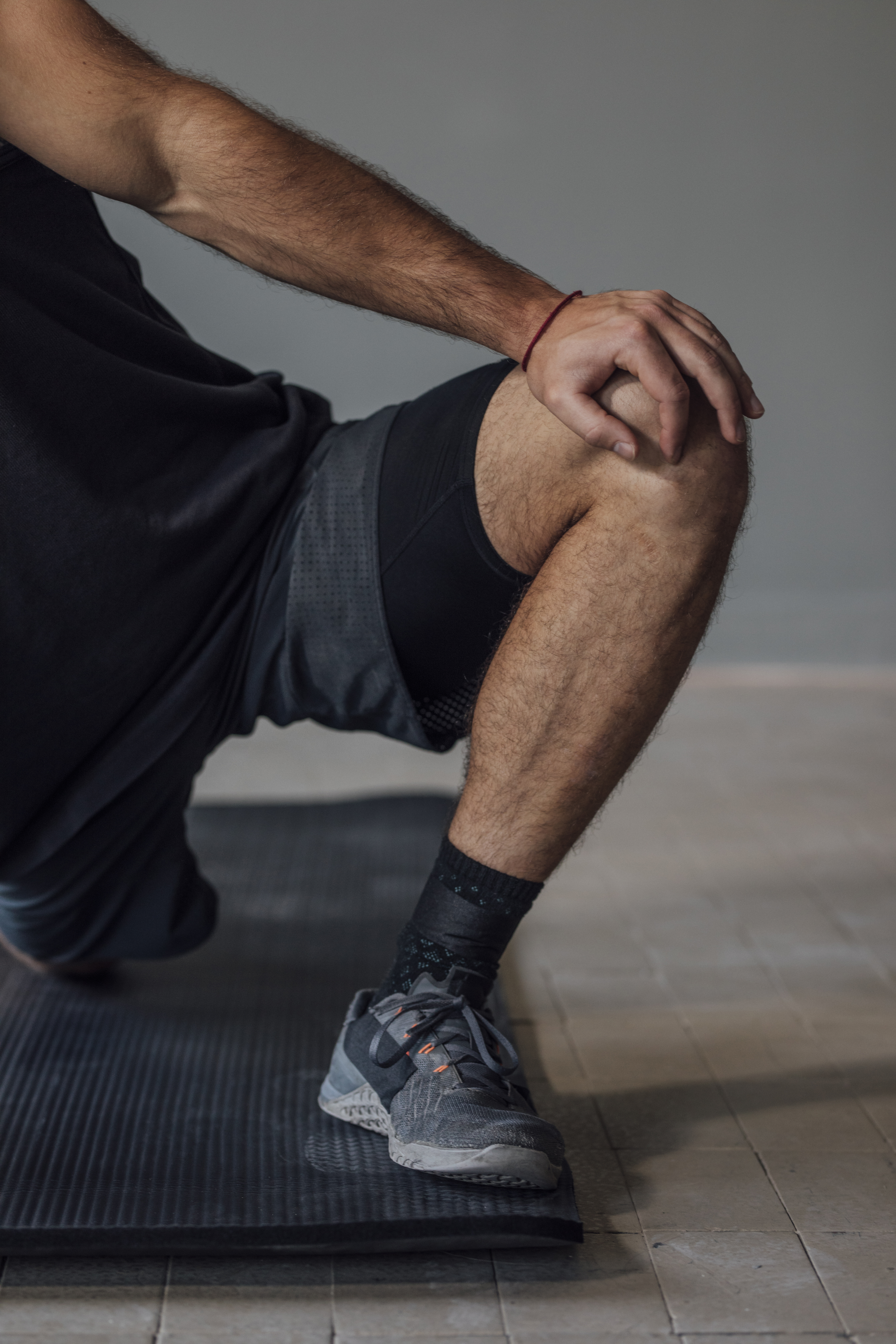 Athlete mid-session in a 7 in short over a compression base layer
